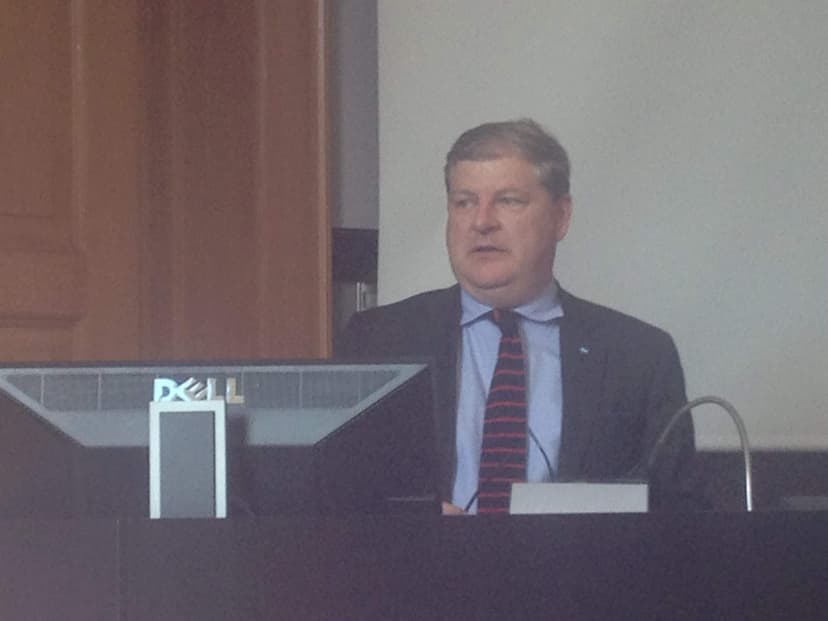 Angus Robertson speaking at podium